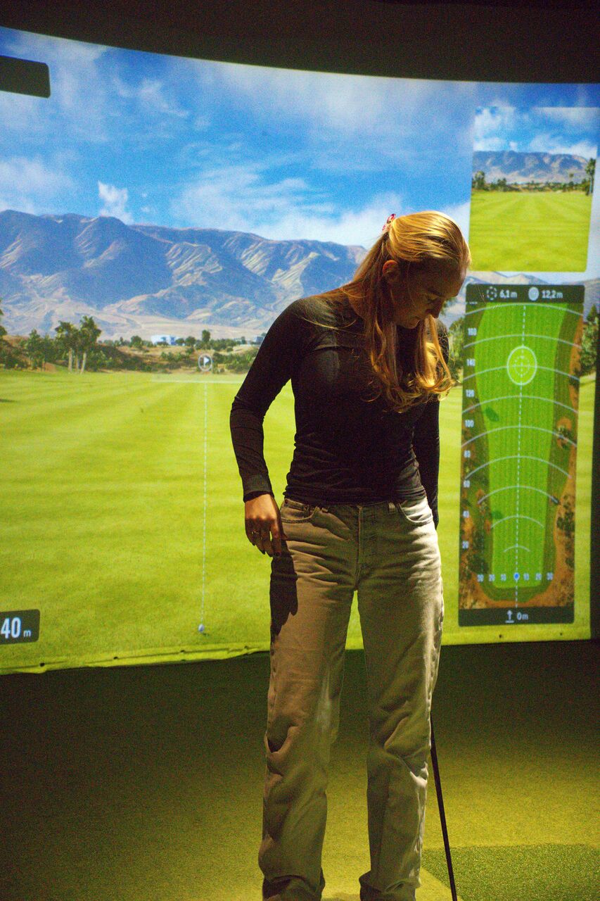 Spelare i GTG Golf Trackman-simulator